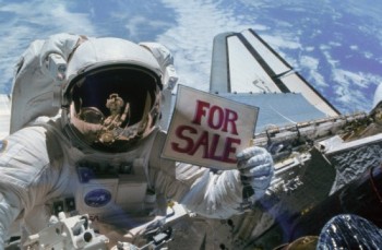 Dale Gardner spacewalking astronaut with for-sale sign