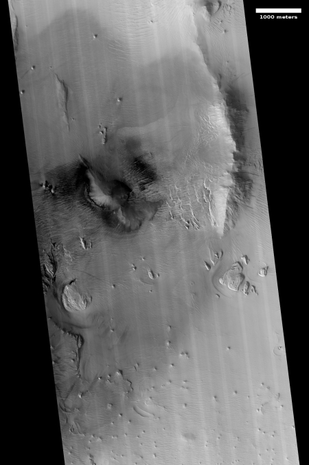 Dark splotches on slopes of Olympus Mons