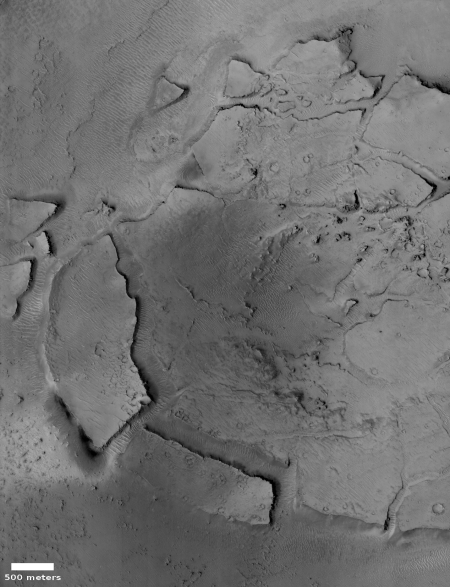 Fractured and collapse Martian crater floor