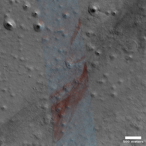 Dust devil steak across a slushy plain on Mars