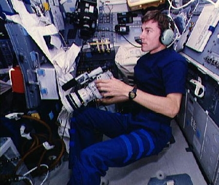 Krikalev on the shuttle to ISS flight in 1998