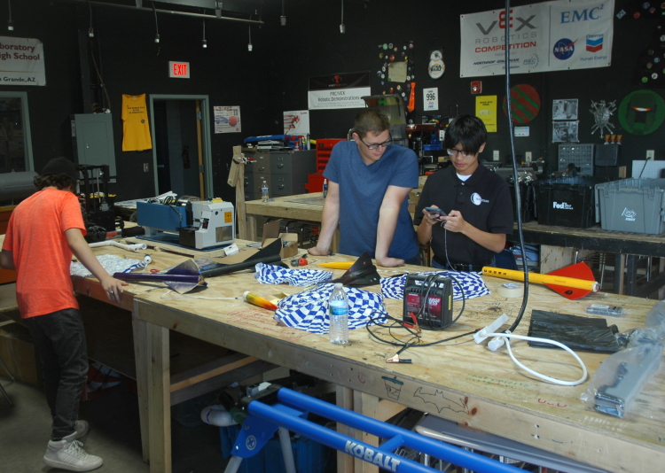 Sean and Dylan fixing a rocket parachute