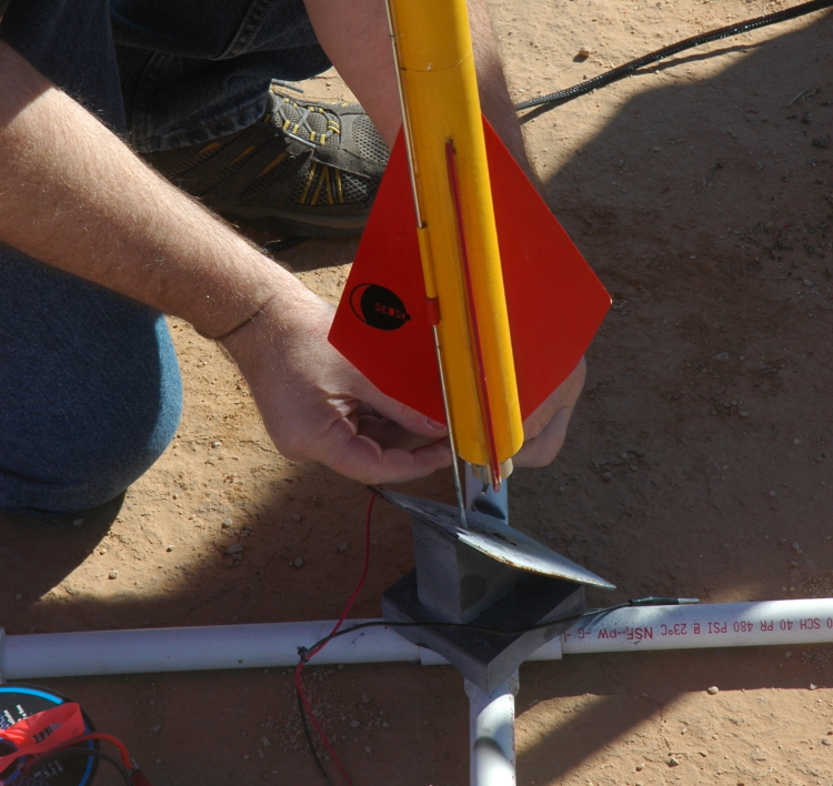 Prepping the rocket at the launch tower