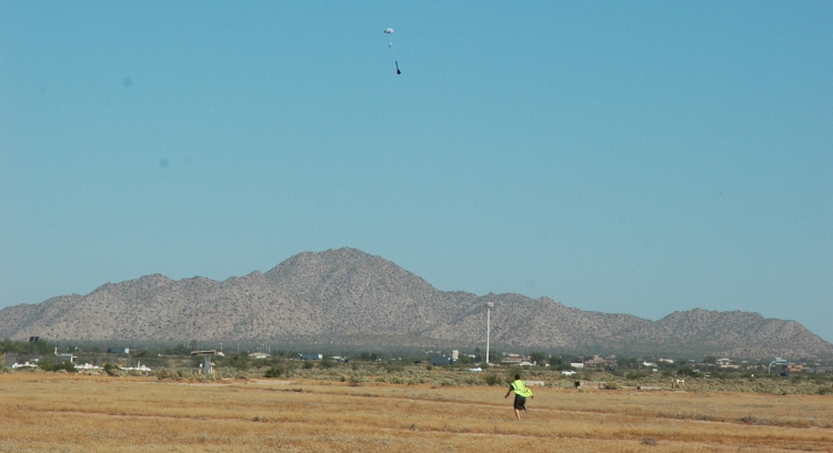 Evan chasing Sophia's rocket