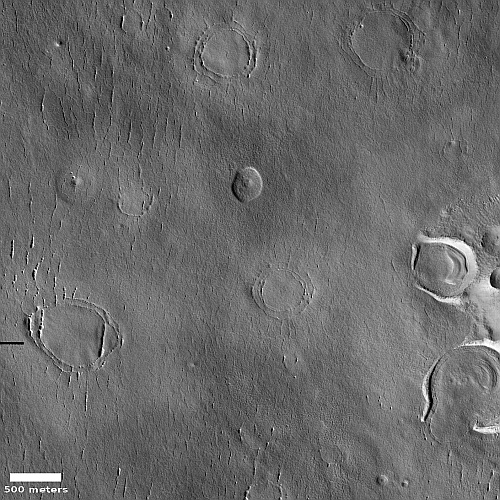 Expanded craters in Martian ice
