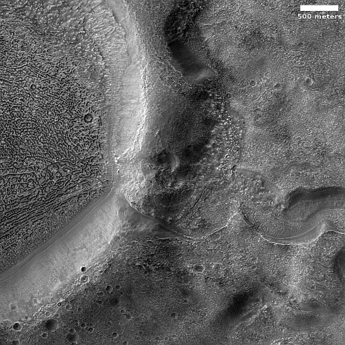 Drainage out of a Martian crater