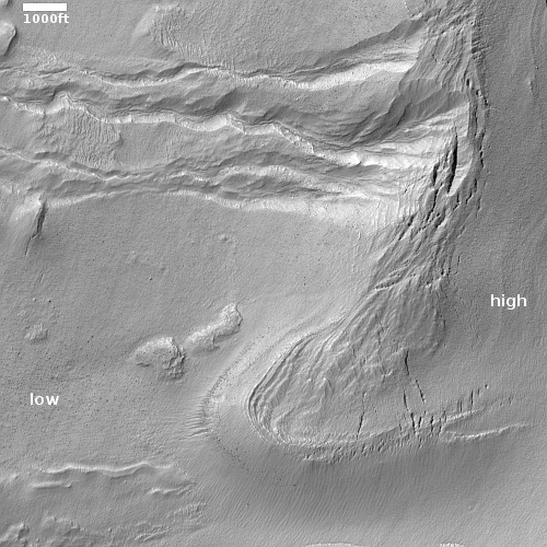 A half-mile Martian cliff on the verge of collapse