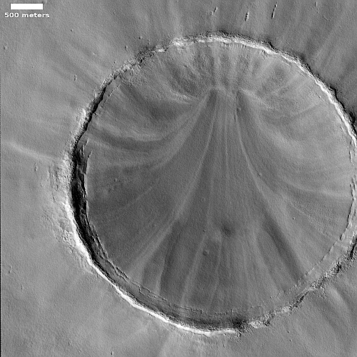 A Martian crater with a surface pattern like hanging draperies