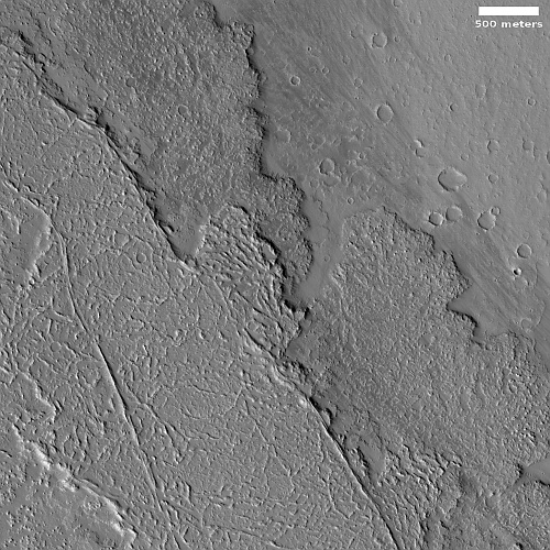 Where the flood lava of two gigantic Martian volcanoes meet