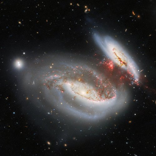 The chaos between galaxies following their head-on collision