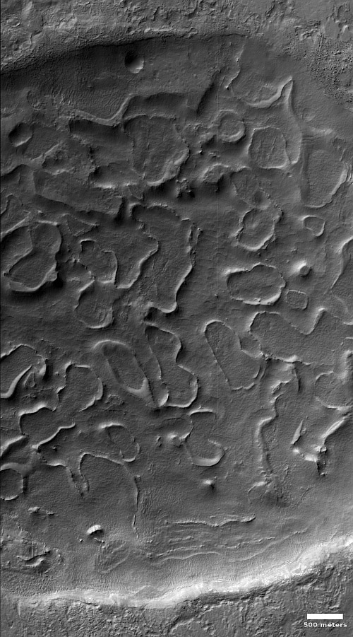 The peeling floor of a crater in the southern cratered highlands of Mars