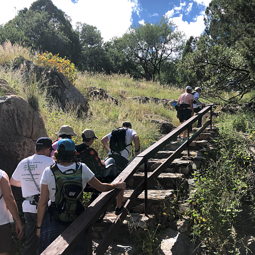 The Tucson crew for Luke 5 Adventures takes a hiker uphill