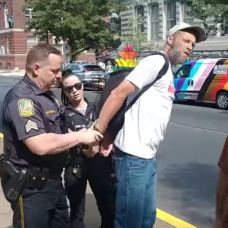 Damon Atkins being arrested by McClure for quoting Bible