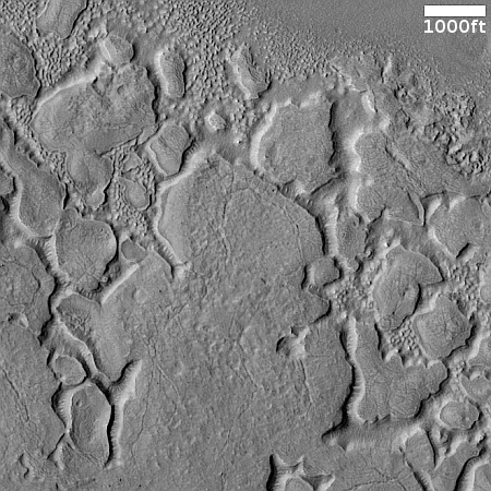 Martian ice sheets resembling paint peeling