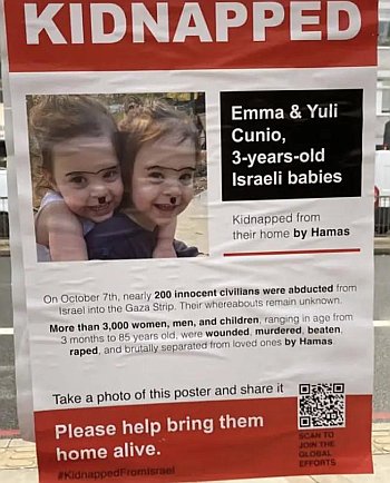 The faces of babies held hostage desecrated