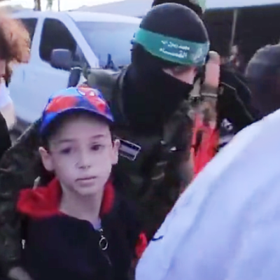 The first child hostage, 9-year-old Ohad Mundar, being released by Hamas