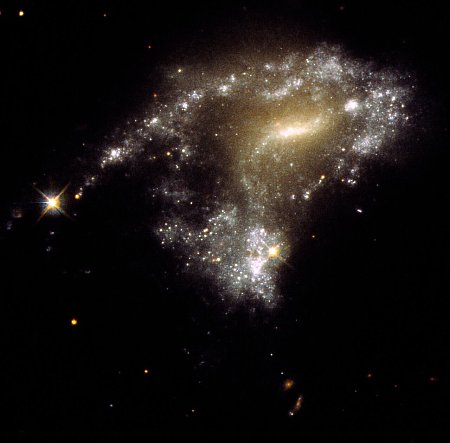 A galaxy with a tail of newborn stars