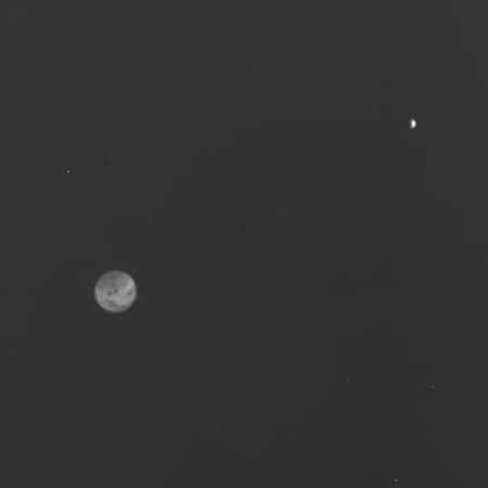 The Earth and Moon system as seen by Hera