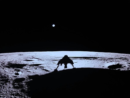 Blue Ghost's shadow on the Moon, with the Earth in the background