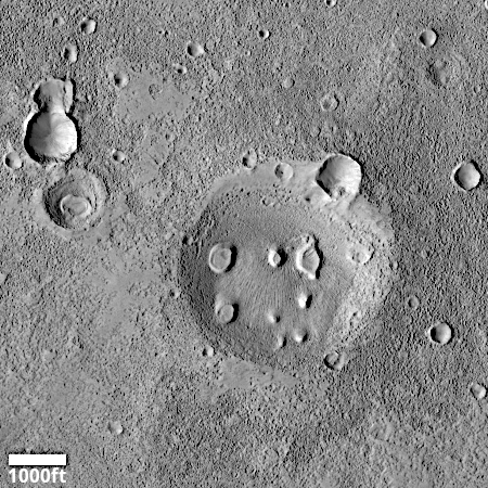 Round deposits in a crater