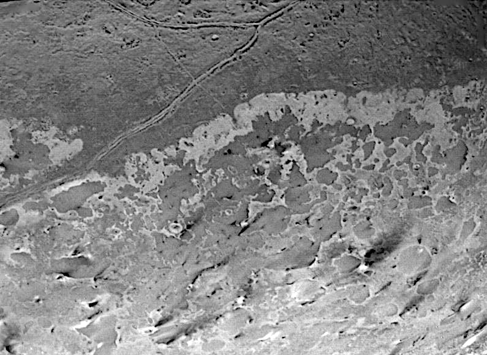 The southern mid-latitudes of Neptune's moon Trident