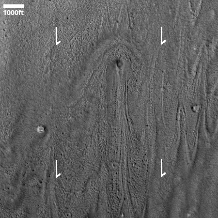 A Martian glacier flowing arond a recent crater impact