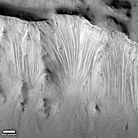 Gigantic slumping Martian cliffs
