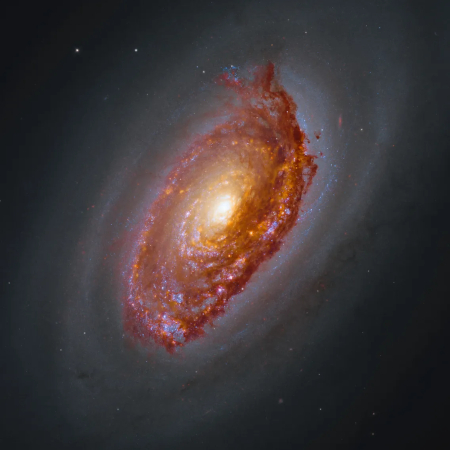A galaxy seen by Hubble and Webb